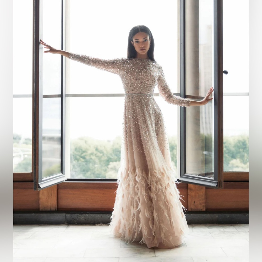 DISC EMBELLISHED SEQUIN GOWN WITH FEATHER DETAIL